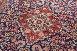 Surface texture of 2000s Jozan rug with natural Wool and intricate pattern