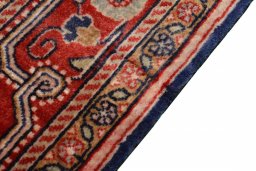 Backside of handmade 2000s Jozan rug showing knot structure and weave density