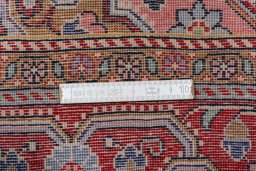 Close-up detail of 2000s Jozan rug from Iran / Persia showing Wool weave