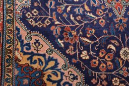 Backside of handmade 2000s Jozan rug showing knot structure and weave density