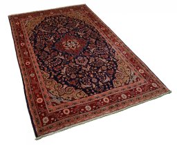 Close-up detail of 2000s Jozan rug from Iran / Persia showing Wool weave