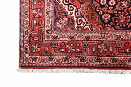 Corner detail of 1970s Jozan rug showing border pattern and Wool pile