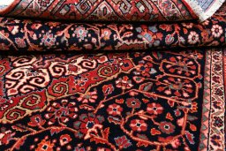 Close-up detail of 1970s Jozan rug from Iran / Persia showing Wool weave