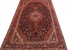 Surface texture of 1970s Jozan rug with natural Wool and intricate pattern