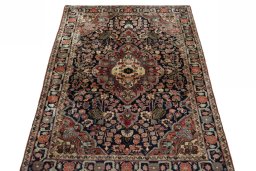 Surface texture of 1950s Jozan rug with natural Wool and intricate pattern