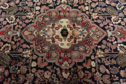 Central medallion detail of 1950s Jozan rug from Iran / Persia