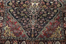 Corner detail of 1950s Jozan rug showing border pattern and Wool pile