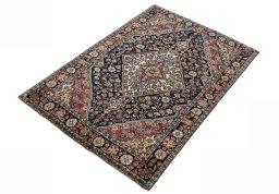 Corner detail of 1950s Jozan rug showing border pattern and Wool pile