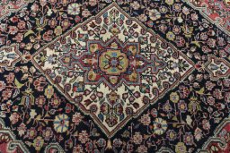 Central medallion detail of 1950s Jozan rug from Iran / Persia