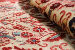 Close-up detail of 1990s Jozan rug from Iran / Persia showing Wool weave