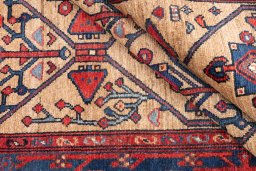 Corner detail of 1973s Koliai rug showing border pattern and Wool pile