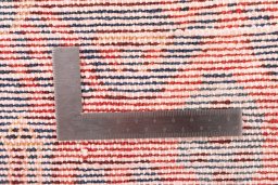 Close-up detail of 1973s Koliai rug from Iran / Persia showing Wool weave