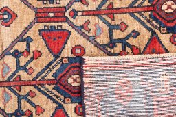 Close-up detail of 1973s Koliai rug from Iran / Persia showing Wool weave