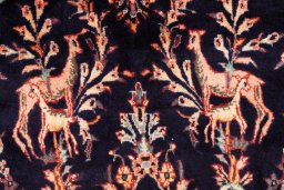 Corner detail of 1975s Koliai rug showing border pattern and Wool pile