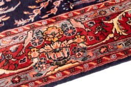 Backside of handmade 1975s Koliai rug showing knot structure and weave density