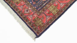 Backside of handmade 1990s Kurdi rug showing knot structure and weave density