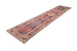 Corner detail of 1900s Kurdi rug showing border pattern and Wool pile
