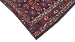 Backside of handmade 1990s Kurdi rug showing knot structure and weave density