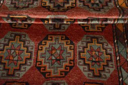 Corner detail of 2000s Kurdi rug showing border pattern and Wool pile