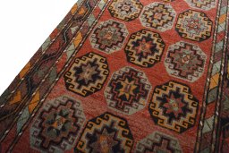 Backside of handmade 2000s Kurdi rug showing knot structure and weave density