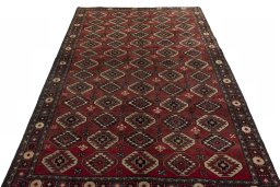 Surface texture of 1970s Kurdi rug with natural Wool and intricate pattern