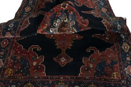 Surface texture of 1950s Kurdi rug with natural Wool and intricate pattern