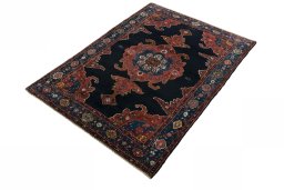 Corner detail of 1950s Kurdi rug showing border pattern and Wool pile