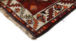 Backside of handmade 1990s Kurdi rug showing knot structure and weave density