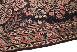 Surface texture of 1950s Lilian rug with natural Wool and intricate pattern