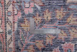 Close-up detail of 1950s Lilian rug from Iran / Persia showing Wool weave