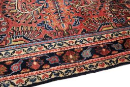 Backside of handmade 1980s Lilian rug showing knot structure and weave density
