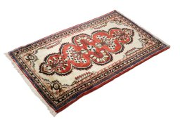 Close-up detail of 1990s Lilian rug from Iran / Persia showing Wool weave