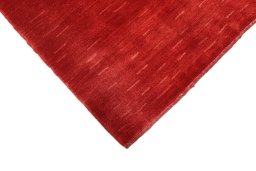 Backside of handmade New Lori rug showing knot structure and weave density