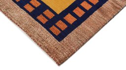 Backside of handmade New Lori rug showing knot structure and weave density