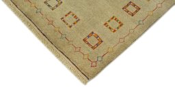 Backside of handmade New Lori rug showing knot structure and weave density