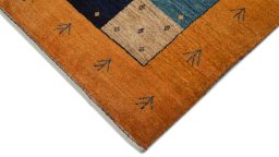 Backside of handmade New Lori rug showing knot structure and weave density