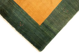 Backside of handmade New Lori rug showing knot structure and weave density