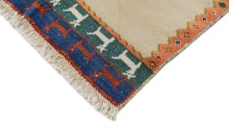 Backside of handmade New Lori rug showing knot structure and weave density