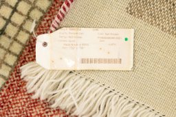 Corner detail of New Lori rug showing border pattern and Wool pile