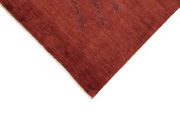 Backside of handmade New Lori rug showing knot structure and weave density