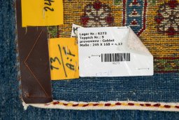 Corner detail of 2010s Lori rug showing border pattern and Wool pile