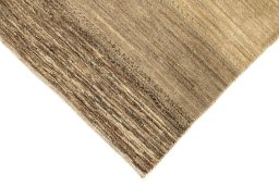 Backside of handmade New Lori rug showing knot structure and weave density