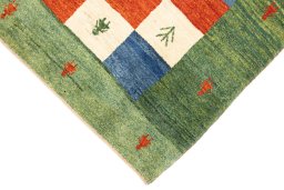 Backside of handmade New Lori rug showing knot structure and weave density