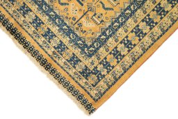 Backside of handmade New Lori rug showing knot structure and weave density