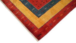 Backside of handmade New Lori rug showing knot structure and weave density
