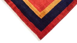 Backside of handmade New Lori rug showing knot structure and weave density