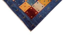 Backside of handmade New Lori rug showing knot structure and weave density