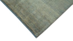 Backside of handmade New Lori rug showing knot structure and weave density