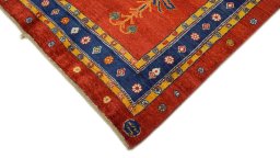 Backside of handmade New Lori rug showing knot structure and weave density