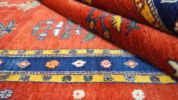 Full view of New Lori rug from Iran / Persia, 203 × 137 cm in Dark red tones